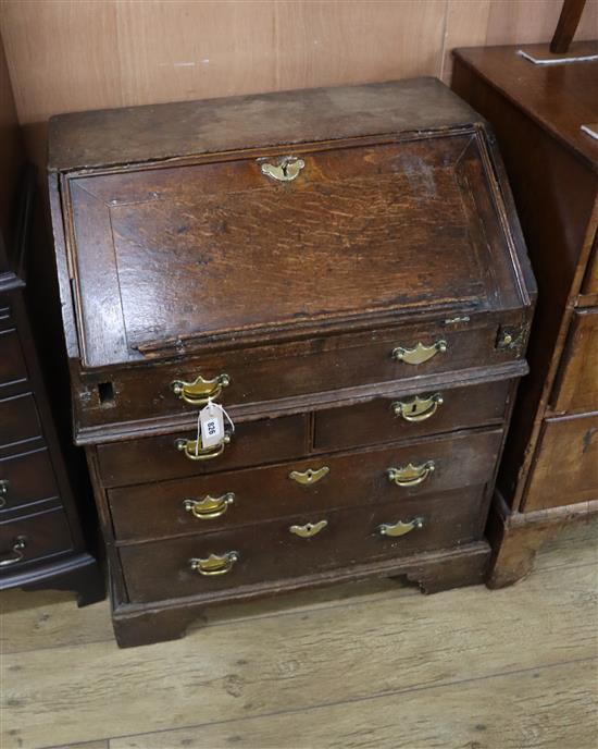 A small 18th century oak bureau W.70cm